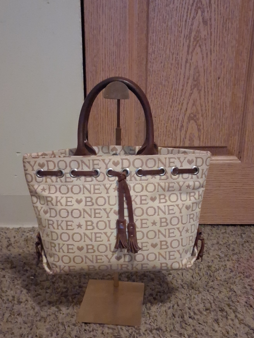 Dooney & Bourke Beige Logo Canvas Tote with Brown Leather Handles